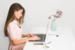 laptop-woman-sm-1__opdb-op60053a8f498495-21042074-1