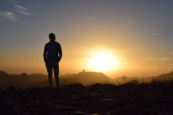 man-woman-sunset-sunrise-standing-lookout-vista-view-mountains__opdb-op61dd70a34d9981-72620389